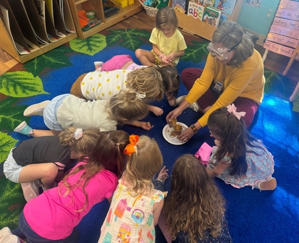 Teacher with students